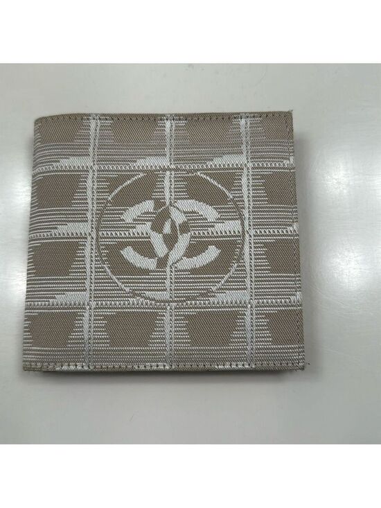 CHANEL Handbags - Chanel - Cloth Bifold wallet - great condition AUTHENTIC